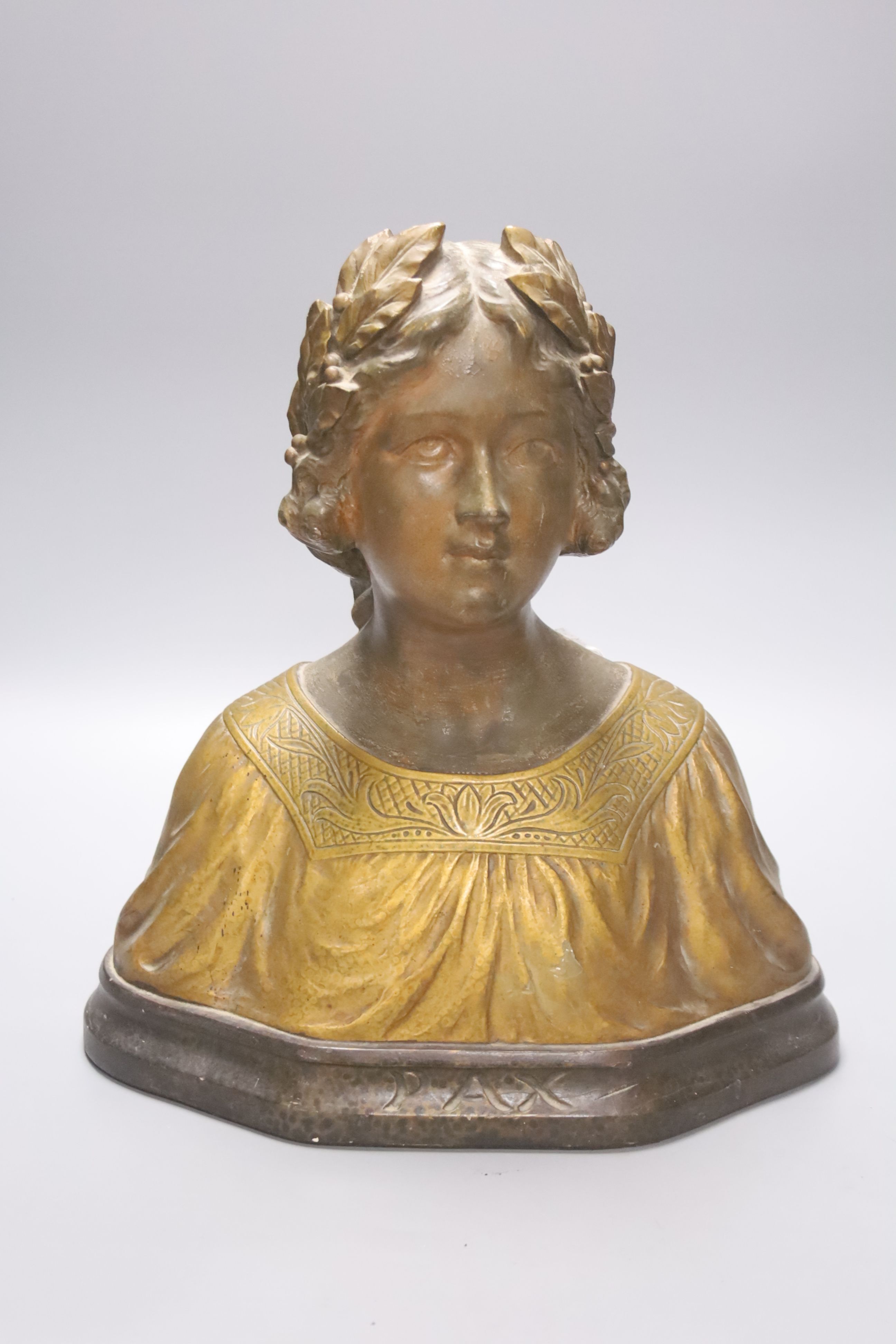 An Art Nouveau plaster bust 'Pax' of a girl wearing a wreath gilt decoration, signed to reverse G.V. Vaerenbergh?, height 32cm